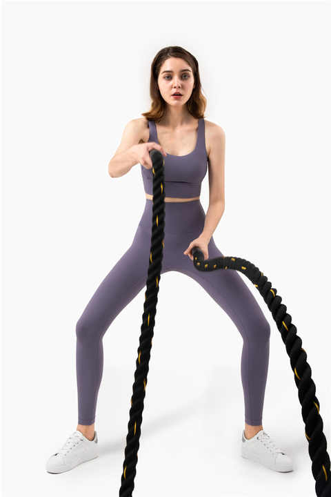 Alt: " High waisted criss cross back leggings two piece Set product image – Acuvick " Women’s criss cross back sports top with matching high waist leggings set