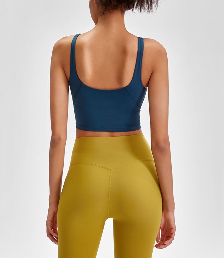 Alt: " Beyond Yoga Slim Racerback Cropped Tank for Woman product image – Acuvick " Close-up detail of Beyond Yoga slim racerback cropped tank fabric