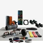 Fitness accessories for home workout including foam roller and ab wheel