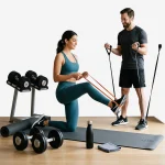 Fitness equipment including dumbbells resistance bands yoga mat and workout accessories