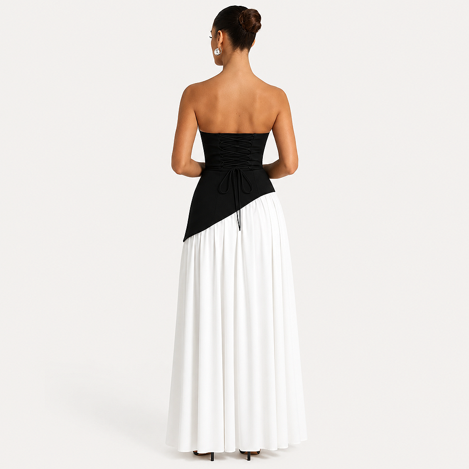 Back view of the Premium Strapless Mesh Evening Maxi Dress in black and white featuring a strapless neckline, elegant flowing maxi silhouette, breathable mesh fabric, and sophisticated two-tone design for weddings and formal occasions.