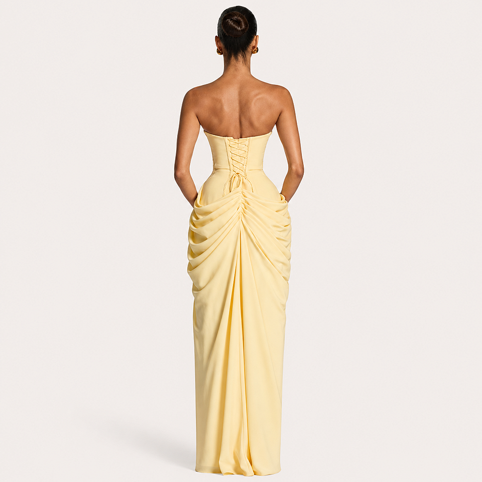 Back view of the Premium Strapless Mesh Evening Maxi Dress in Yellow 2 colour featuring a strapless neckline, elegant flowing maxi silhouette, breathable mesh fabric, and graceful rear design for weddings, evening parties, and formal occasions.