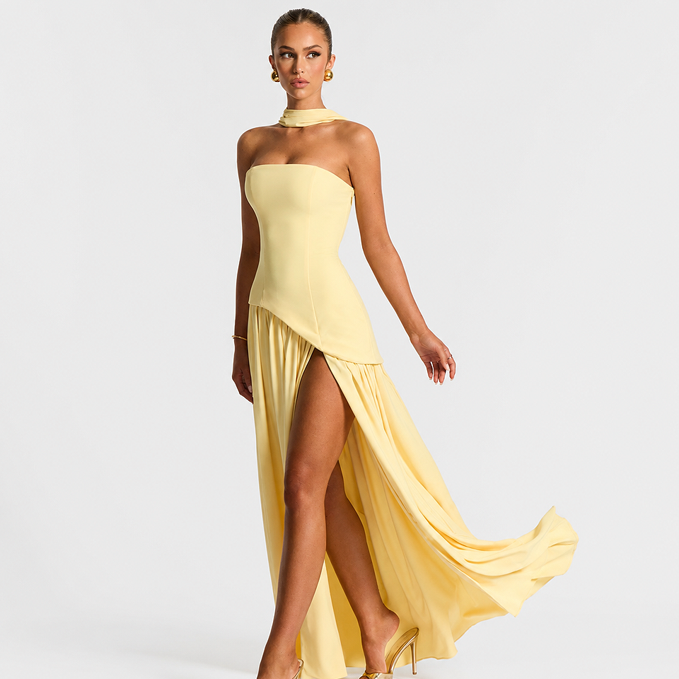 Premium Strapless Mesh Evening Maxi Dress in yellow for women featuring a strapless neckline, lightweight breathable mesh fabric, elegant maxi silhouette, and flowing design for weddings, parties, and formal occasions.