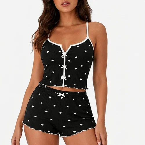 Women's satin heart print pajama set featuring a sleeveless cami top and matching shorts, designed for soft, lightweight, and comfortable sleepwear.