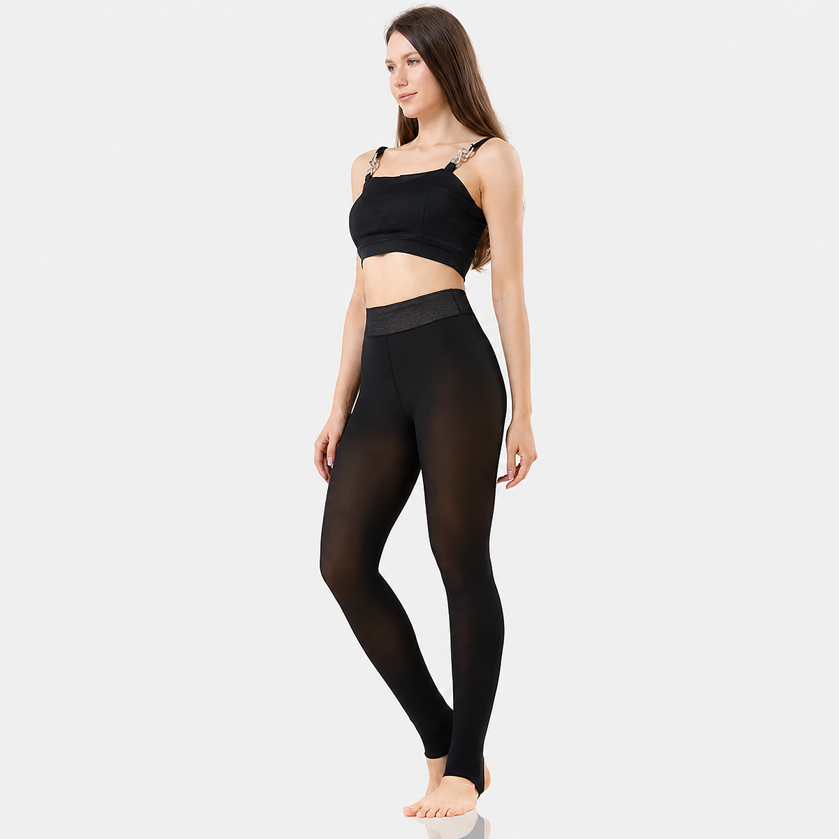 Women's Fleece Thermal Leggings and Tights for Winter in Black with full foot socks, warm fleece lining, and stretch fit for everyday cold-weather comfort.