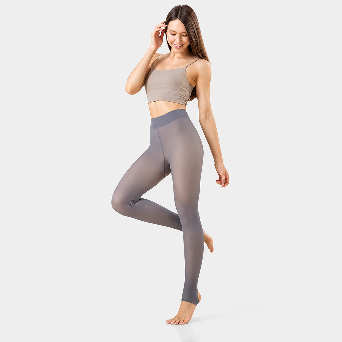 Women's Fleece Thermal Leggings and Tights for Winter in Grey with full foot socks, soft fleece lining, high-stretch fabric, and warm everyday comfort.