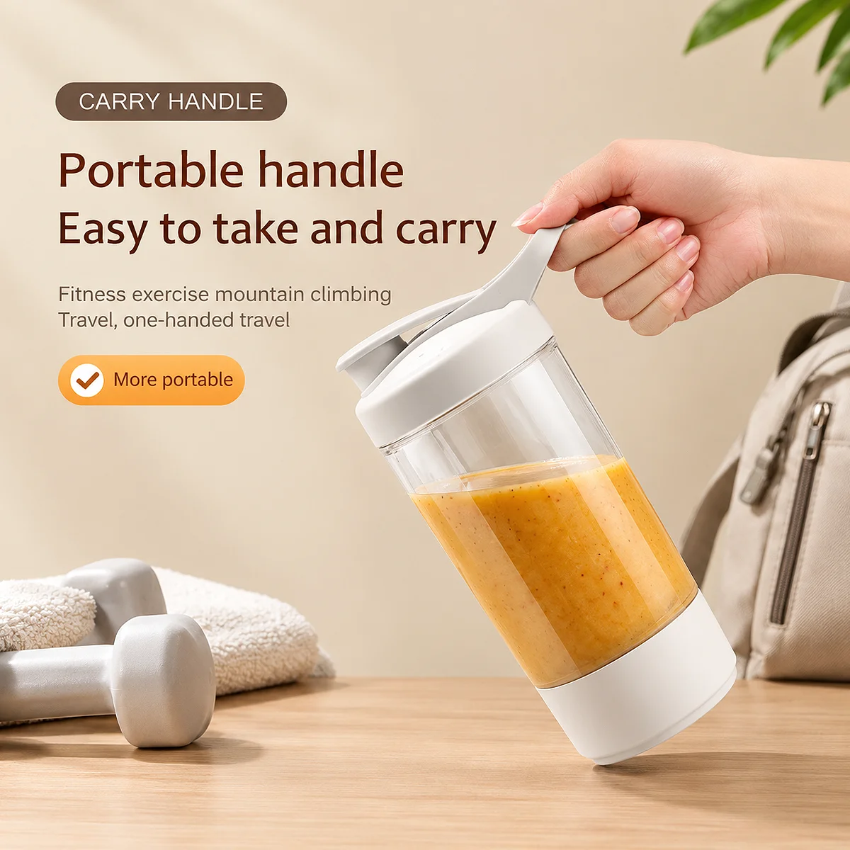 White Acuvick portable personal blender with easy-carry handle containing an orange fruit smoothie next to gym weights.