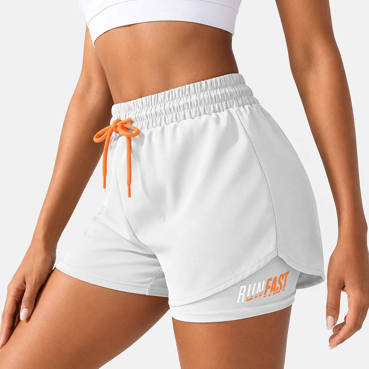Alt: " Women’s High-Waisted Running Shorts product image – Acuvick " Women’s White high-waisted running shorts with compression liner