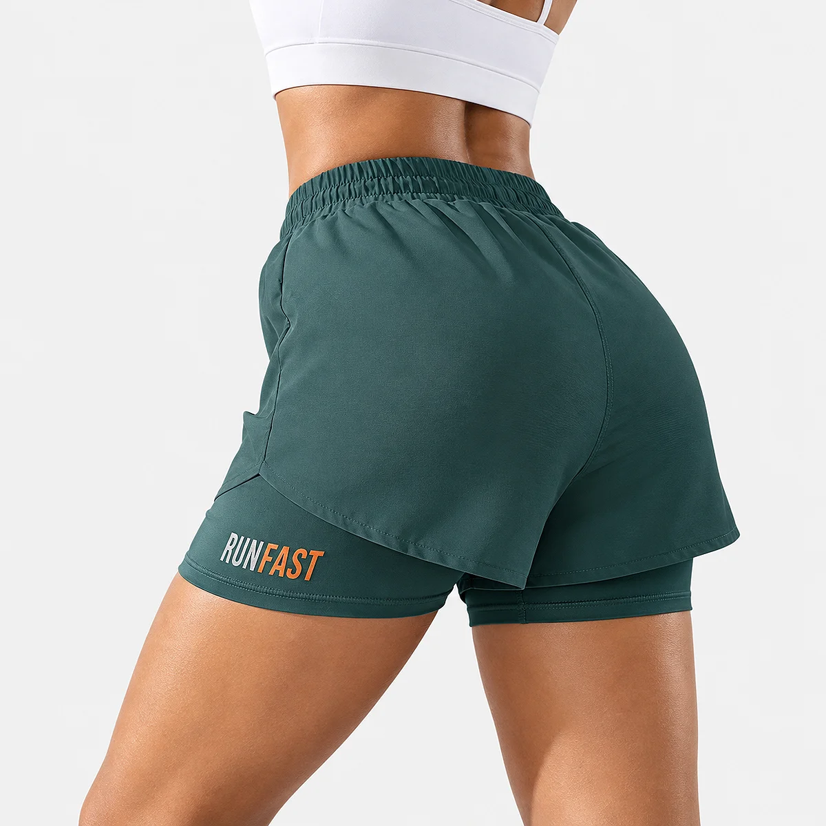 Alt: " Women’s High-Waisted Running Shorts product image – Acuvick " Rear view of a person wearing green high-waisted 2-in-1 women's fitness shorts, showing the compression lining coverage and fit.